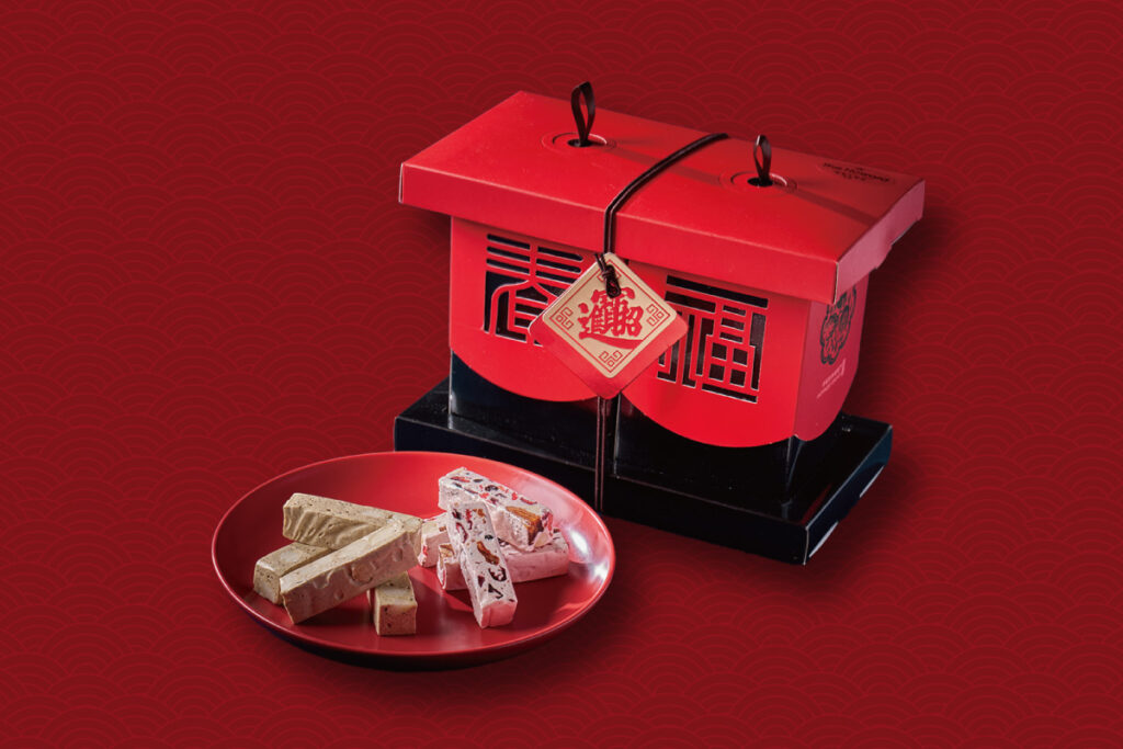 【點心坊】造型討喜的迎春納福牛軋糖禮盒售價688元_台北福華大飯店提供