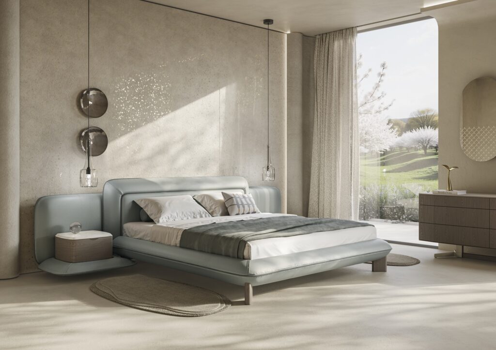 NATUZZI FLOW 以巨型枕狀靠背與整合式床頭設計，提供全方位的包覆舒適感